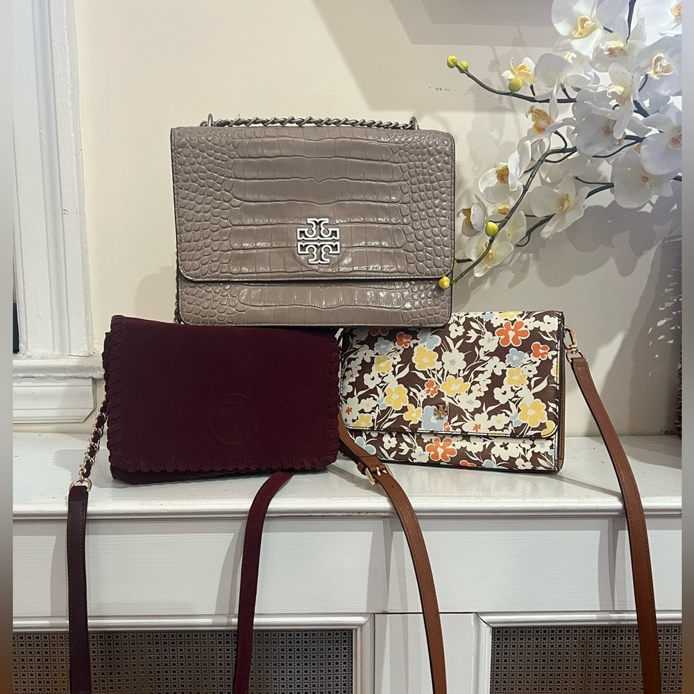 Three TORY BURCH grey alligator burgundy wine suede and brown floral flap bags